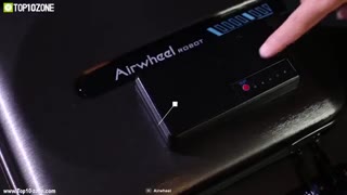 Frame at second 6: removable battery pack with labels